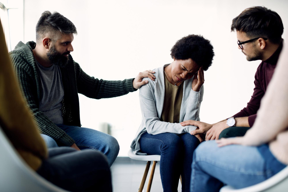 A support group seated in a circle